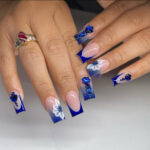 Stunning Blue French Tip Nails with Design for Your Next Appointment