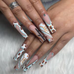 Obsessed With Cow Print French Tips? See These Designs
