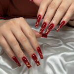 Red Nails with Gold Design That Are Perfect for Birthdays & Holidays